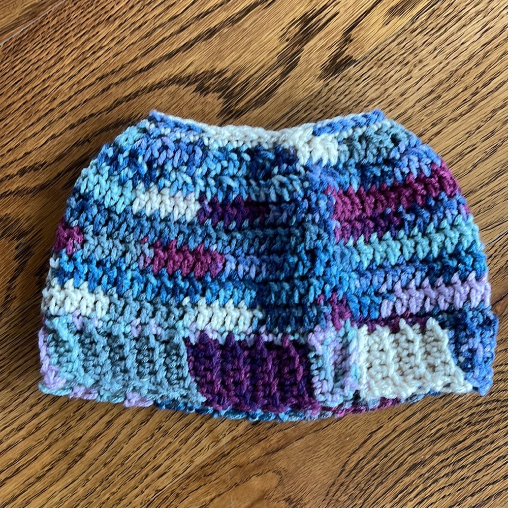 Adorable hand made crochet “messy-bun” beanie